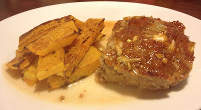 portion of sriracha meatloaf with butternut squash fries