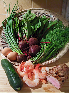 Basket of Beets with Greens, Cucumber, Green Onion, Dill, Eggs, Cooked Shrimp, and Roasted Pork