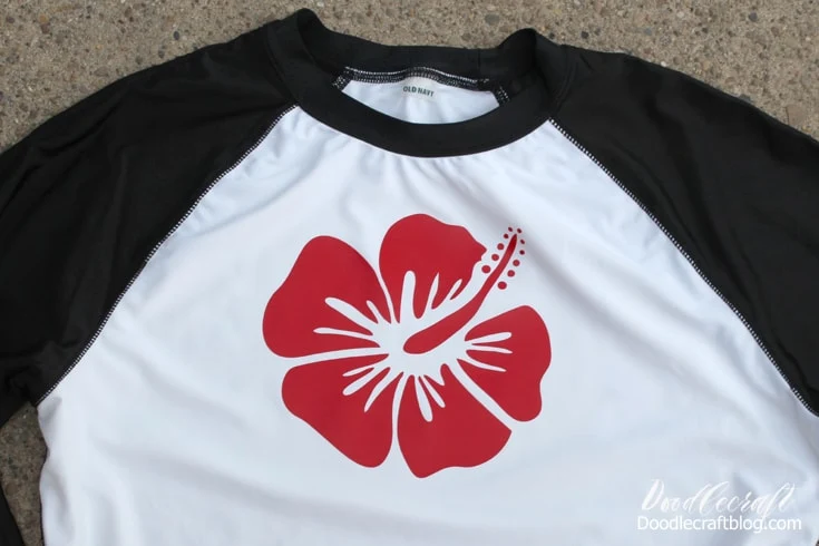 Protect yourself from the rays of the sun with a custom rashguard shirt with tropical hibiscus flower in red.