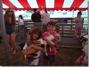 Michelle and Ashleigh with lambs.