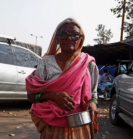 closeup of old woman beggar