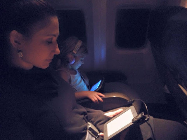 mom and daughter on plane