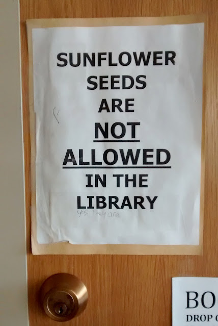 No sunflower seeds in library, Chenier Branch, Lafayette Public Library, Louisiana. February 2015. Credit: Mzuriana.