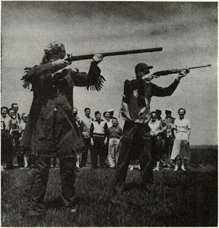 Another rifle often pictured as Remington's first is shown being fired in "competition" with modern Remington .280 Model 740 autoloading sporting rifle. The flintlock handled by the "Dan'l Boone" character is a fraud, having a Common Rifle lock of military type glued into an 1840-pattern sporter with putty and plastic wood to fill the gaps. Gun originally had common percussion lock.