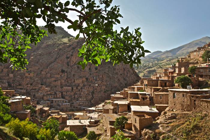 Palangan (meaning leopards in Persian) is a village located 47 kilometers north-west of Kamyaran in Iran's Kurdestan province. This village is spread over both sides of a valley. All of the houses are made of stone and like a staircase they are in a continuous pattern, i.e. the roof of one house is the yard of another house. This village is one of the most beautiful villages of the province not only because of its unique architecture, but also because of its beautiful nature. It is located beside a river which flows into the Sirwan River. This area was one of the important regions of Kurdistan from Saljooqi period on and Palangan Castle which is next to the village over a mountain bears witness to this claim. (source: Islamic Republic of Iran's Minister of Interior)