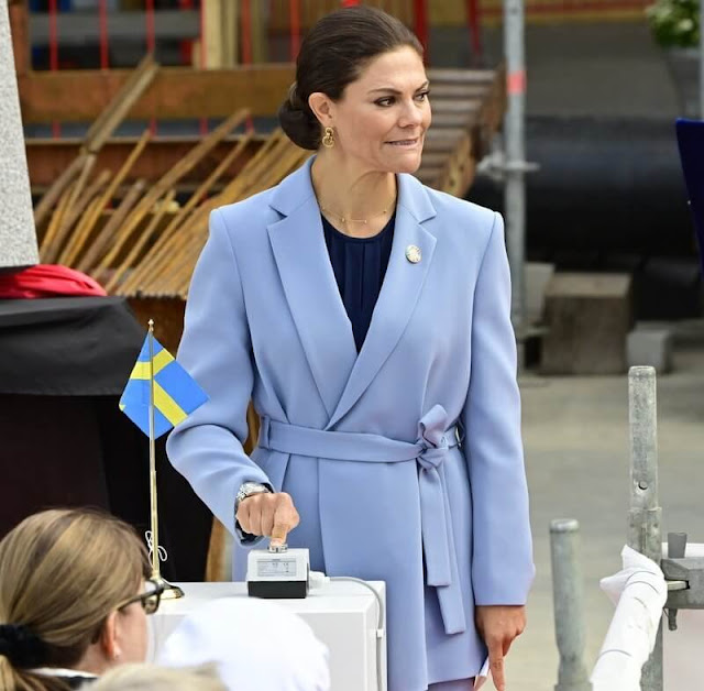 Crown Princess Victoria wore a light blue ayden wrap blazer, suit, jacket trousers by Andiata, gold earrings