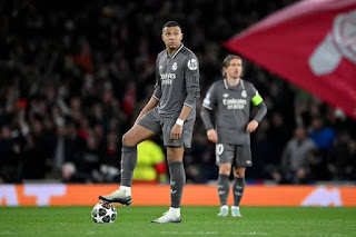 UEFA Champions League, Real Madrid vs Arsenal, team lineup, injury report, match preview, football tactics, European football, quarter-final