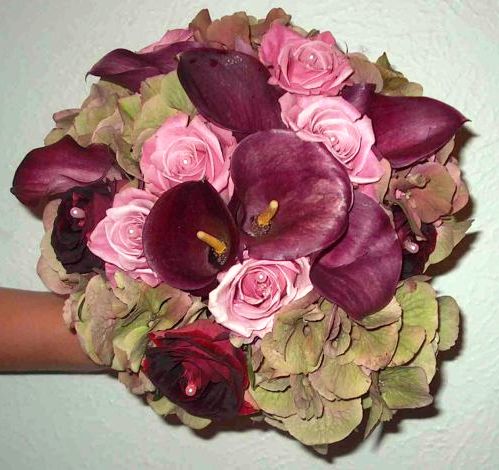 Wedding flowers bouquet with some red cala lily pink and red rose