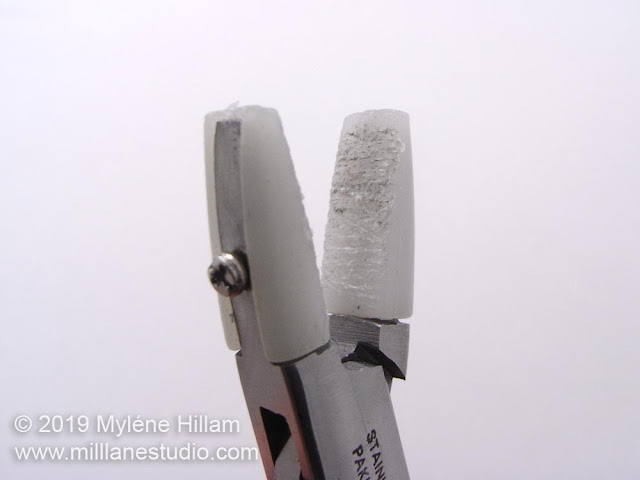 Nylon jaw pliers with hacked up nylon sleeves