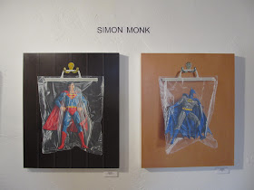 Simon Monk Superheros in bags at Aqua Art Fair, Miami 2012