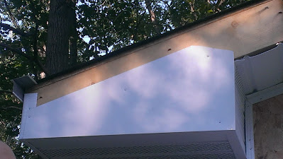 Siding the soffits.