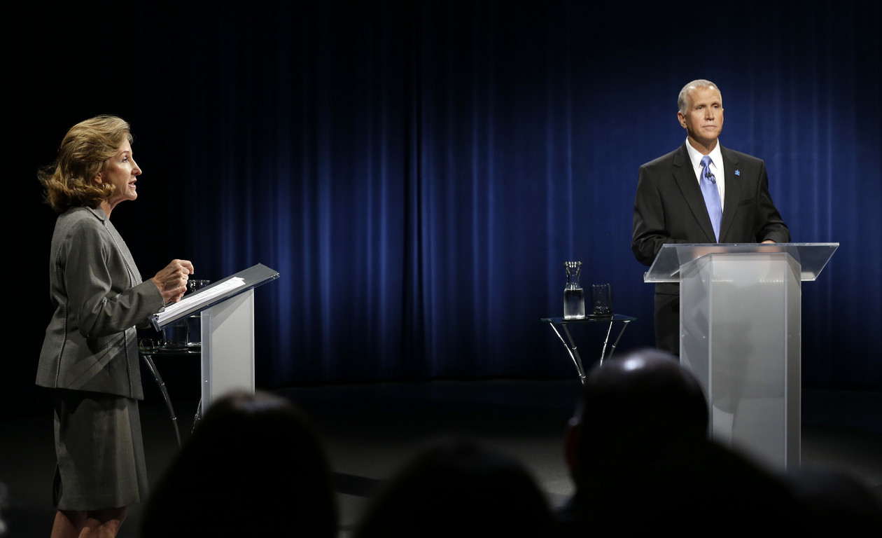 Sen. Kay Hagan and Thom Tillis take part in a live broadcast banter at UNC-television studios in Exploration Triangle Park, N.C., on Sept. 3, 2014. | Gerry Broome, Pool/AP Photograph