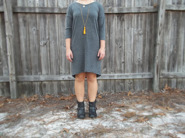 grey knit cocoon dress orange tassel necklace simple necklace filigree black ankle booties outfit dressember dress donate human trafficking