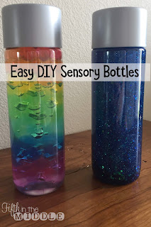 Rainbow water beads and blue, green, and purple glitter sensory bottles