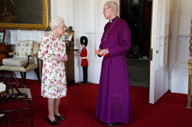 Queen Elizabeth wore a floral print silk dress. The Queen met Archbishop of Canterbury Justin Welby at Windsor Castle