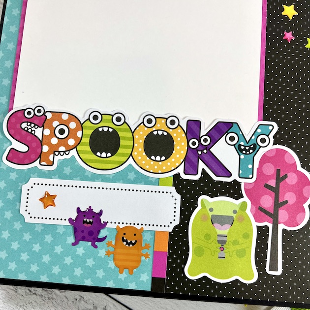 Doodlebug Monster Madness Halloween Scrapbook Page with spooky word