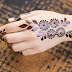 Short  mehandi design on back hand 