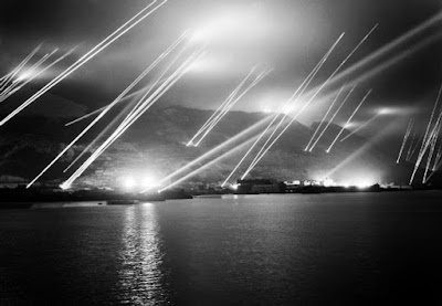 Searchlights in the night sky during an air-raid practice on Gibraltar, 20 November 1942.