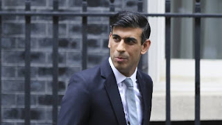 Son of an immigrant and against refugees, Who is Rishi Sunak, the new British Conservative leader? The road is paved for Rishi Sunak to become the first British Prime Minister of Indian origin after all his rivals in the leadership race of the ruling Conservative Party withdrew. Meanwhile, Sunak promises to implement anti-immigrant policies and expand deportation procedures.  After his failure last September, Richie Sunak succeeded in becoming the leader of the Conservative Party, and thus the first Indian Prime Minister in Britain. That is after the party's elections on Monday, from which all the candidates withdrew, leaving the road paved for Sunak towards his leadership.  On the other hand, despite being of foreign origin and the son of a family with an immigrant background, Sunak is a self-proclaimed anti-refugee, promising to implement broad policies to combat refugee waves and expand the deportation procedures established by his predecessor Johnson. In addition to this, he had previously ignored numerous complaints by Muslim actors of Islamophobia in the country, which led many to accuse him of normalizing with that racist discourse.  New Downing Street resident  Earlier in the afternoon, Conservative Party leadership candidate Penny Mordaunt announced her withdrawal from the race to make way for Sunak to win the post. "These are unprecedented times. Despite the tight time in the party leadership contest, colleagues clearly felt we needed certainty today," Mordaunt said in a statement, adding, "They (party members) made this decision in good faith for the good of the country."  And before that on Sunday, former Prime Minister Boris Johnson announced that he was withdrawing his candidacy for the Conservative leadership, after he had intended to return to the post he left last July. Johnson justified his withdrawal with his commitment to "maintain party unity" and that his ambition to return to Downing Street "simply wouldn't be the right thing to do".  This paved the way for former Finance Minister Rishi Sunak to win the party leadership and then the British Prime Minister after obtaining 155 deputies. After his victory was announced , Sunak said : "The time for internal debates in the party is over (...) We need to focus on politics, not personalities, and I appeal to you to work for unity," vowing to work daily "to help the British people."  Who is Rishi Sunak?  Born in 1980 in Southupton on the south coast of England, Rishi Sunak is the eldest of the three sons of an Indian family, and if he succeeds in winning the Conservative leadership position, he will be the first British Prime Minister of Indian origin.  Sunak was educated at the prestigious Winchester Boarding School, and from there to the universities of Oxford in Britain and Stanford in the United States, where he studied politics and economics. As for his career, he succeeded in occupying several positions in major financial companies of the caliber of Goldman Sachs, and established his own investment company.  Richie Sunak began his political career in 2015 as a national team representative from North Yorkshire. And in 2016, he was one of the first to support the pro-Brexit camp, a choice that earned him the preference of Boris Johnson, who was offered by the Ministry of Finance in 2020 at the age of no more than 39 years.  During his tenure as finance minister, Sunak gained great popularity by allocating a huge budget for benefits to citizens during the health pandemic, and he was one of the first to resign from the government following the outbreak of a scandal that its president, Boris Johnson, had covered up information about sexual abuse by a Conservative MP.  Against refugees and ignores Islamophobia  This time, Richie Sunak was not able to argue with his electoral program and wave his promises to party members in order to attract their votes in his favour, because the victory became decided before running in the elections following the withdrawal of all his competitors. While that program and those promises are not unknown to most conservatives, only two months have passed since the political battle that raged between the new leader and his predecessor, Liz Truss.  For a party that considers the issue of immigrants a major issue in its politics, Sunak's orientations did not deviate from that line. During the previous campaign, he emphasized more than once his determination to work to curb the country's reception of refugees and immigrants, and to tighten reception procedures in exchange for expanding the deportation law to Rwanda enacted by his predecessor, Boris Johnson.  Sunak promised at the time that he would do "whatever it takes" for the success of the scheme to deport the refugees to Rwanda, and gave Parliament the power to decide who would be receiving refugees on the territory of the Kingdom. As he has already said: "Our immigration system is broken and we have to be honest about that. Whether you think immigration should be high or low, we can all agree that it should be legal and controlled."  Sunak pledged that he would refocus the anti-terror plan on "Islamists" and add the adjective "distorting the kingdom" to the concept of extremism, stressing "redoubling efforts to confront Islamic extremism", without referring to the escalating threat of far-right terrorism in his declaration.  This is what a spokesman for the "Muslim Council of Britain" Miqdad Versi described that Sunak "wants to punish the wrong person, and only ordinary British Muslims will be victims of this new policy." He wondered if this policy "will include those who hold political views against the colonial history of our nation or who hate the monarchy, the national anthem, or even one of our national sports teams?"