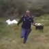 South African Policeman flees snake
screaming after being led
to it by his sniffer dog