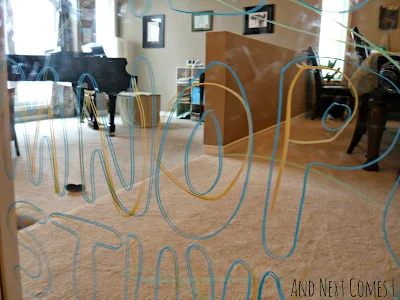 Tracing letters on mirrors with window markers from And Next Comes L