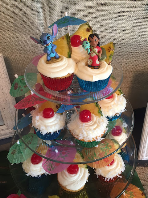 How to plan the perfect party without losing your mind. Birthday parties, bridal showers, baby showers, and other events. Lilo and Stitch luau birthday party. Table decorations and food, cupcakes