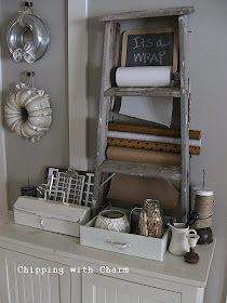 Chipping with Charm:  Getting Organized with Junk, Old Ladder turned Wrap Station...http://chippingwithcharm.blogspot.com/