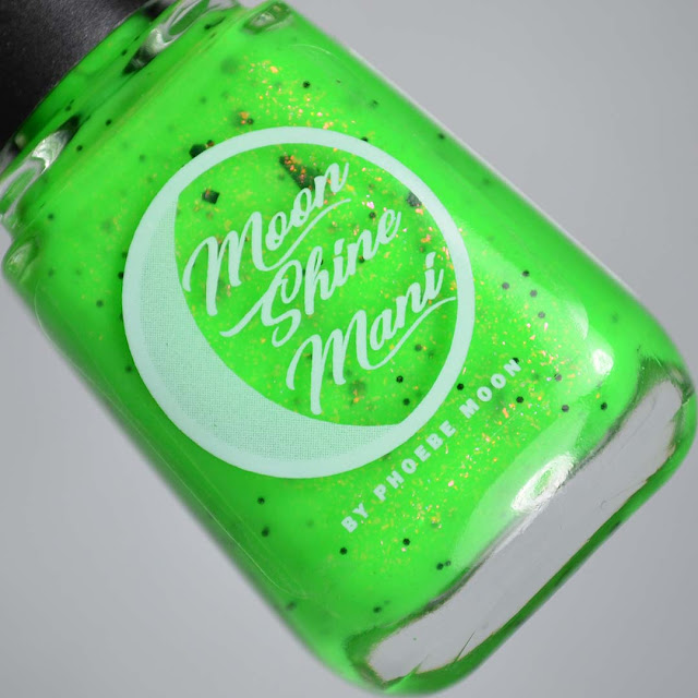 neon green nail polish with black glitter in a bottle