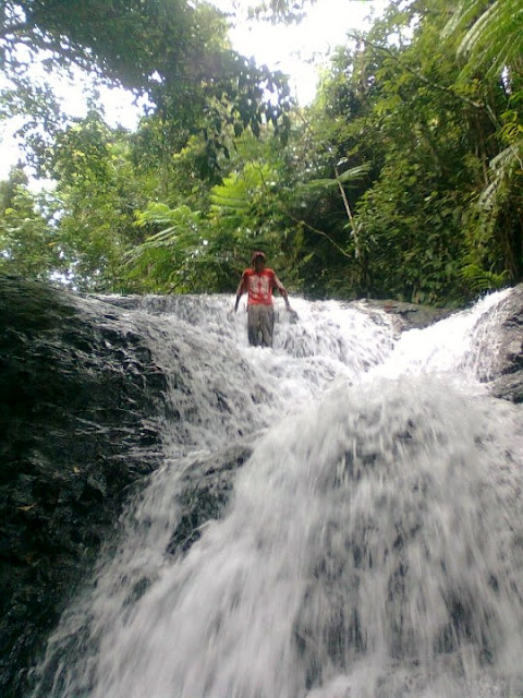 the strong gushing current of the waterfalls