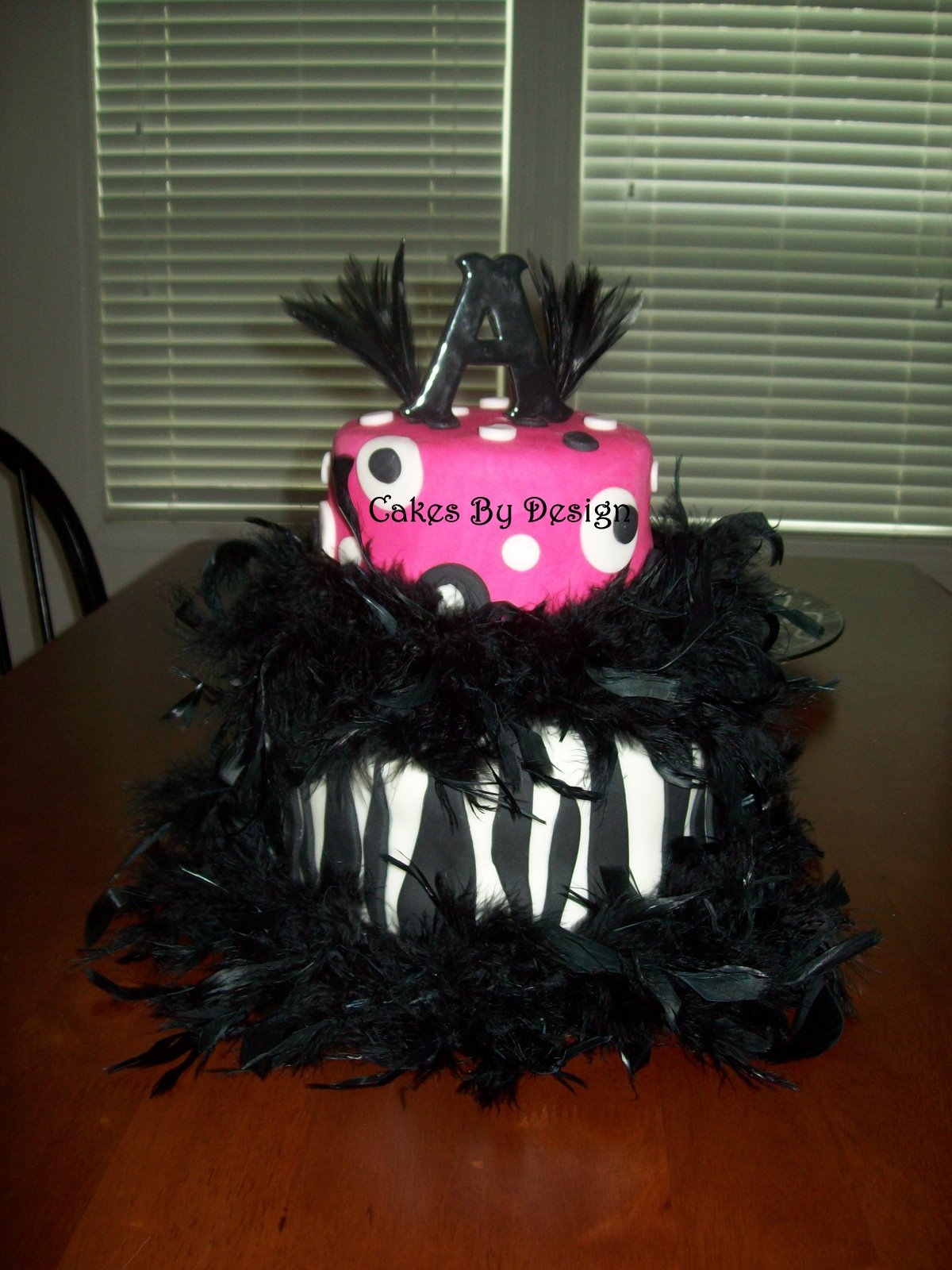 ... Feather Boa Cake. This is a 6 inch and 8 inch stacked cake covered