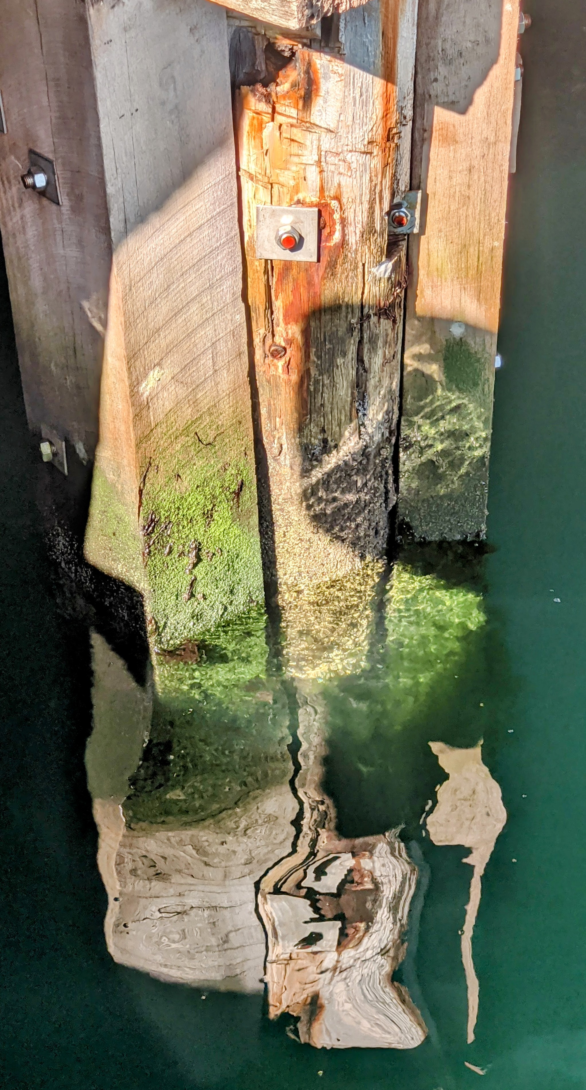 Colourful water reflection of a bridge