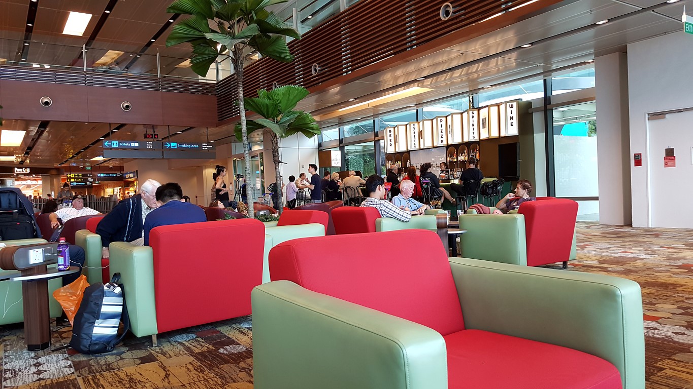 Changi Airport Terminal 1 rest area near the Water Lily Garden and The World Is Flat Bar