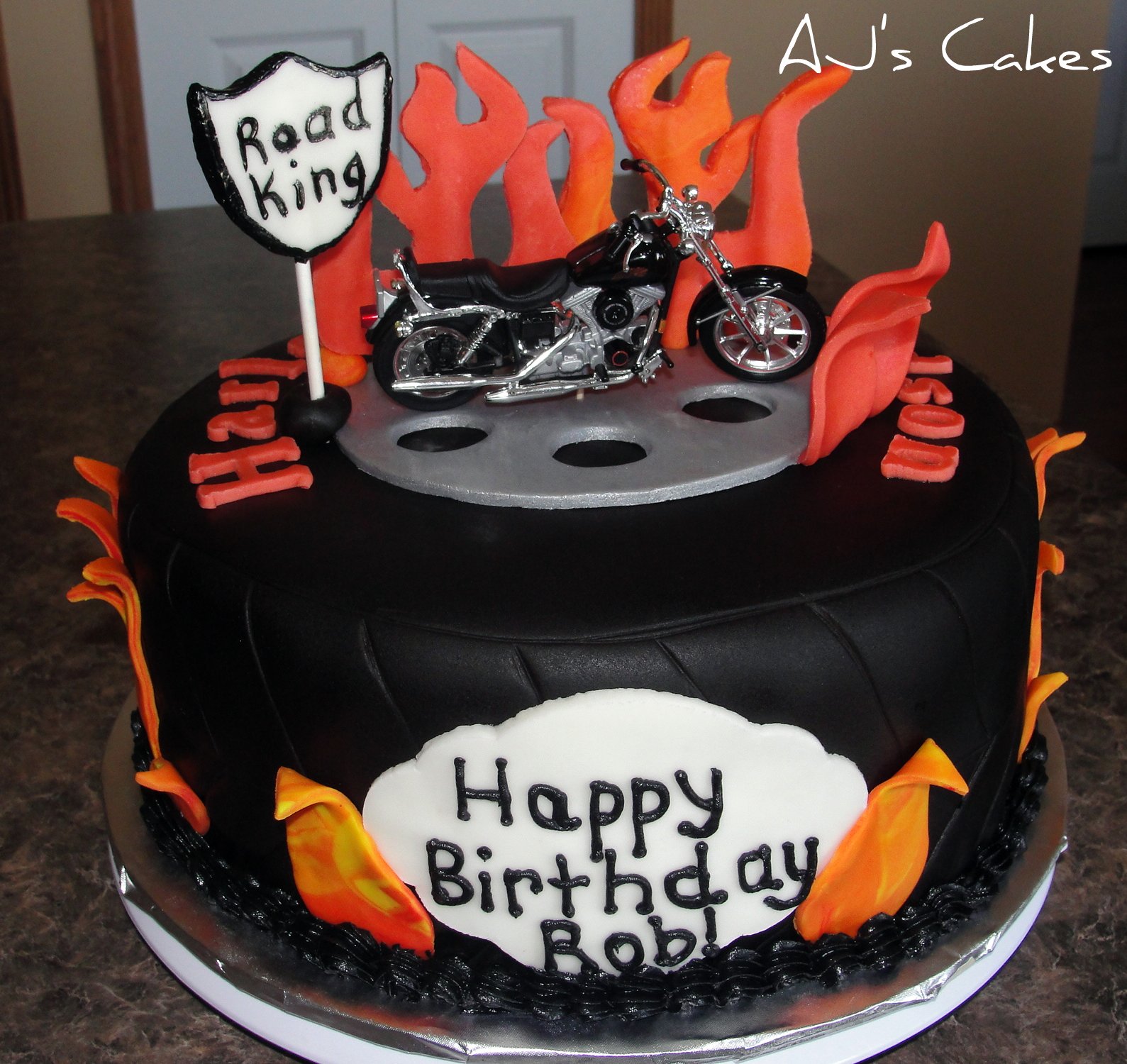 black and yellow motorcycle Tire and Flame Motorcycle Cake