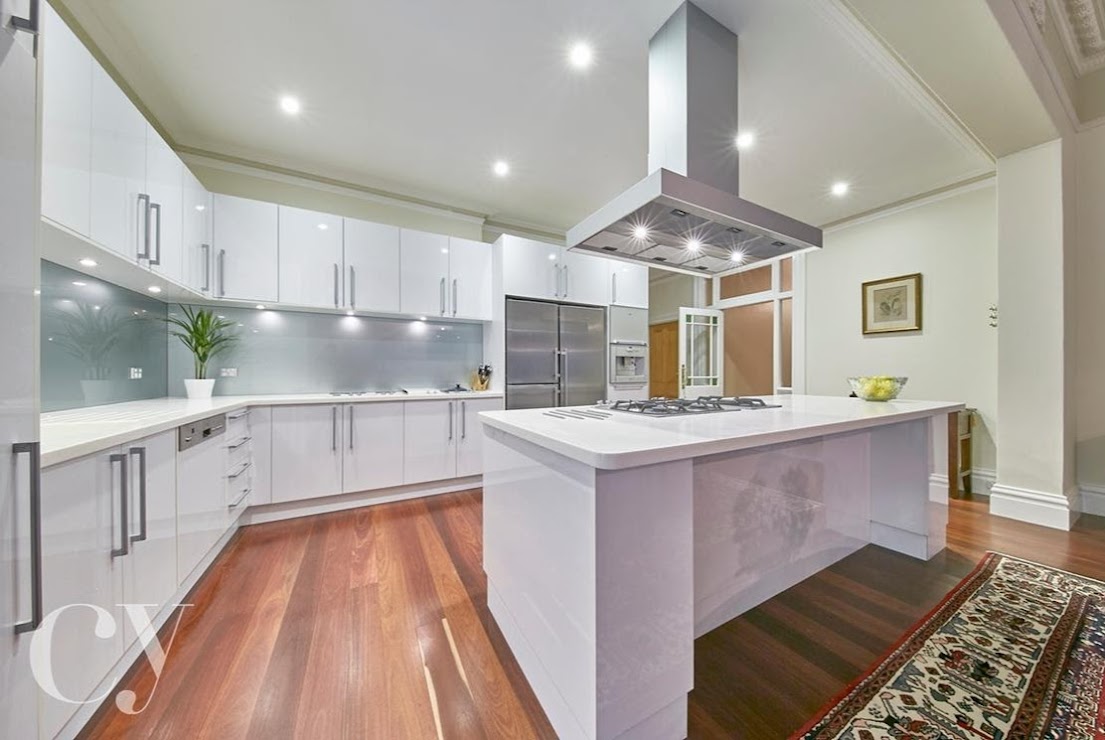 The dazzling kitchen is exquisitely modern, and comes equipped with a full suite of Gaggenau appliances, including range-hood, stove-top with wok burner, deep fryer, steamer and barbecue grill, not to mention the built in coffee machine and convection oven.