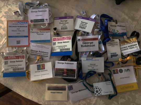 Palmia Observatory Resident Astronomer cleans out old conference badges