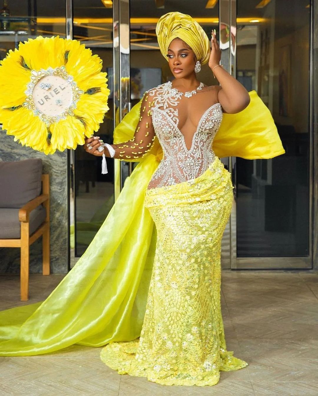 Yellow traditional bridal asoebi style by Uriel Star