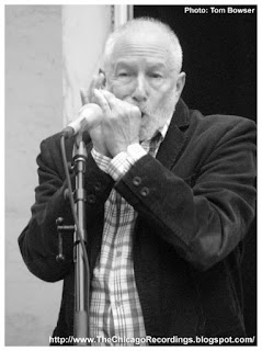 Chicago Blues musician Corky Siegel playing his harmonica during the Chamber Monday concert series in the Chicago Cultural Center | Photograph by Tom Bowser