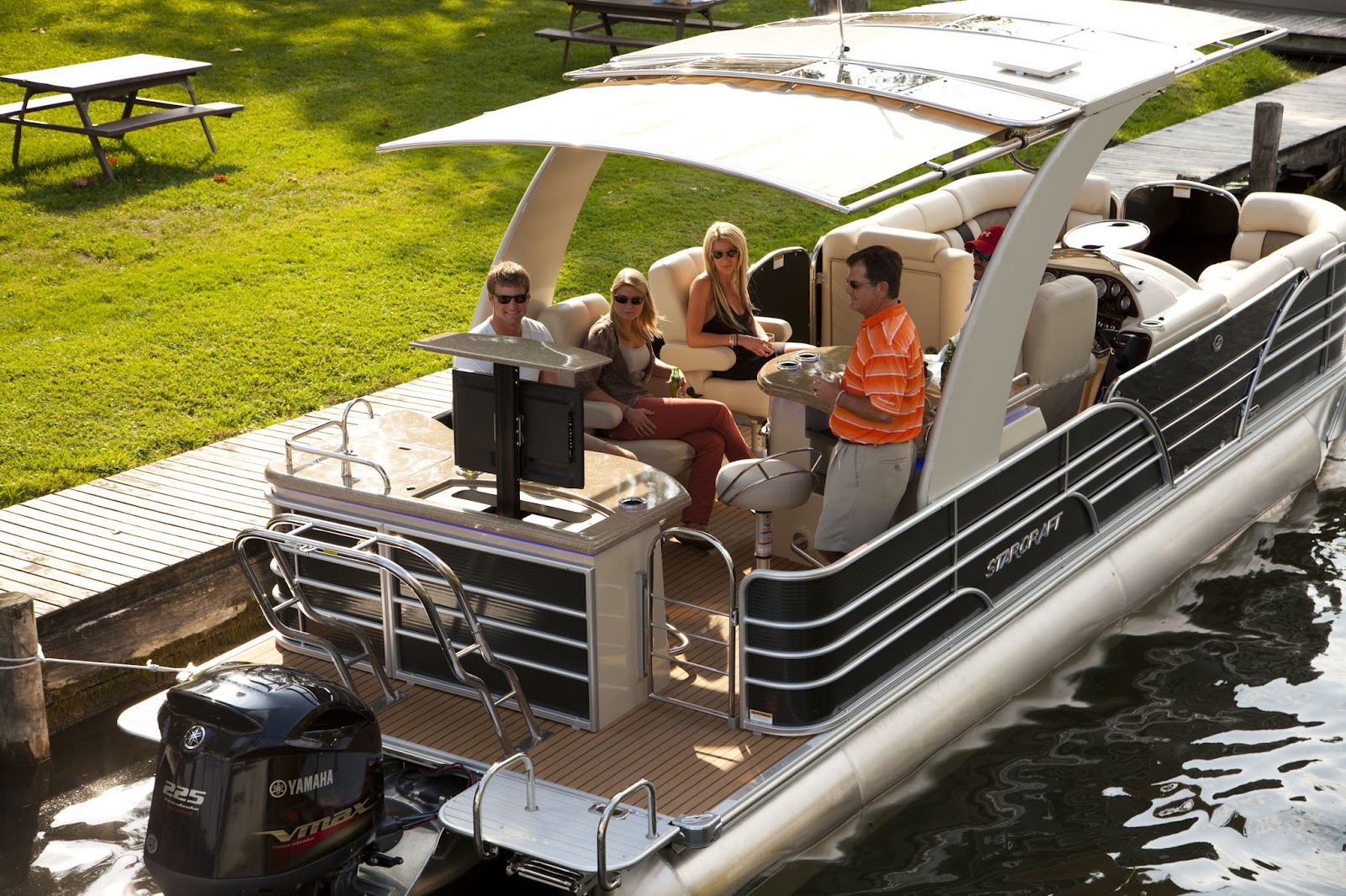 SureShade automated retractable shade makes luxury pontoon boats like 