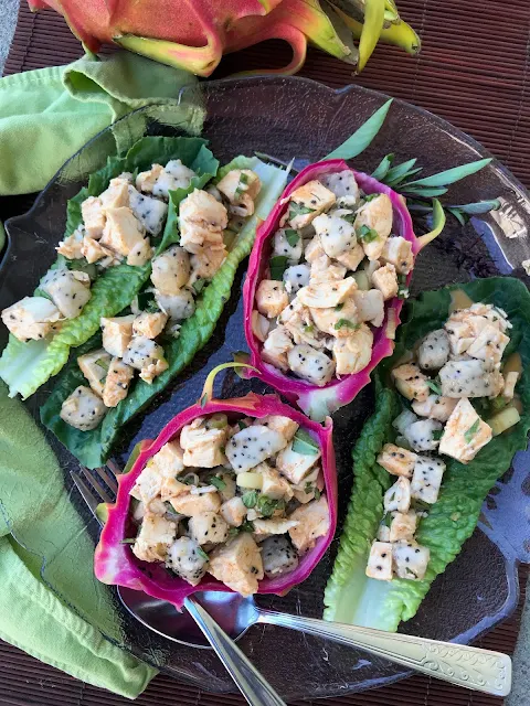 A twist on chicken salad using Thai red curry paste, coconut cream, fresh dragon fruit, and Thai basil for a delicious and fun light dinner or lunch.