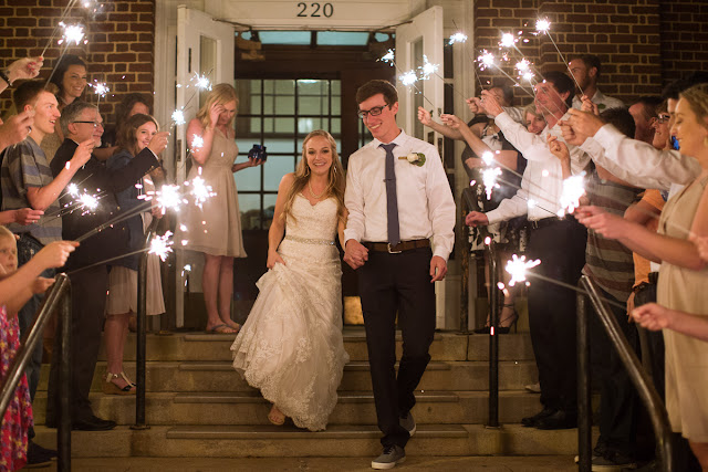 The bride and groom met in college, and have been together for three and a half years.  Maggie said that walking down the aisle towards Jordan was the best part of the day, knowing that they were surrounded by the love and support of friends and family.  She said, "As I walked towards him, Jordan and I were both tearing up and we couldn't look away from each other."  Jordan said that since he was "anxious all day, to the point of feeling sick," the first look was the most memorable part of the day.  He said, "The moment I saw Maggie, I felt 100% relieved, and it made the hours before the ceremony so much more enjoyable."    The Festivities Event Center in El Reno, OK, was the perfect wedding backdrop, with 10' windows, a whole second floor to get ready in, and a romantic setting for the outdoor nuptial.  The bride looked "drop-dead gorgeous" in her lace-embroidered, strapless, wedding gown, followed by her bridesmaids, dressed in individually designed gowns in soft hues of dusty rose.  Each bridesmaid had a spring floral bouquet, similar to the bride's bouquet of pastel pink roses and lilies.    After the couple exchanged wedding vows, pictures of the family and wedding party were taken, and it was time to celebrate!  First dances came next, then guests were invited to enjoy a Mexican buffet.  Dessert included the gorgeous wedding cake, chocolate groom's cake, and assorted, homemade cookies and pastries.  The evening came to a close as the guests sent the star-gazed couple off with sparklers!  The newly married couple escaped to Cozumel and Yucatan Progreso for their honeymoon.  