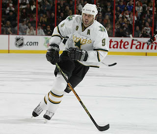 Former Dallas Star Mike Modano skating up ice