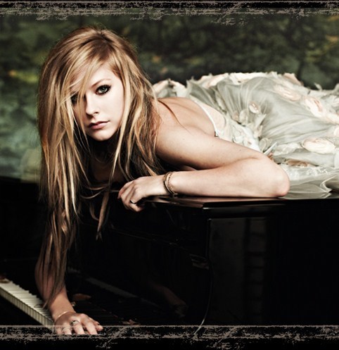 avril lavigne beat up.  with a catchy chorus and an up-beat up-tempo feel to it overall.