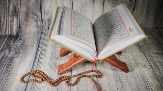 A - Qur'an.