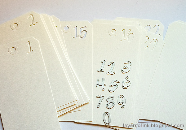 Layers of ink - December Countdown Calendar Tutorial by Anna-Karin Evaldsson. Die cutting the numbers.