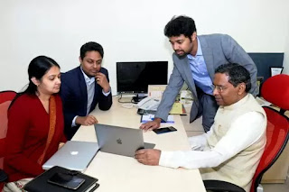 Anand's four children are involved in the business. In the above photo, he is seen at their Noida factory with three of them