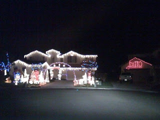 christmas lights ditto spelled out on a house for neighbor