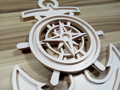 wheel with compass scroll saw pattern