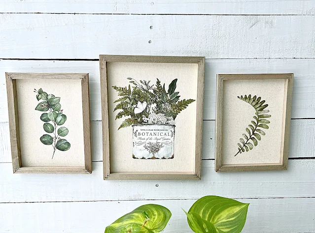 Photo of DIY framed reverse canvas botanical wall art.