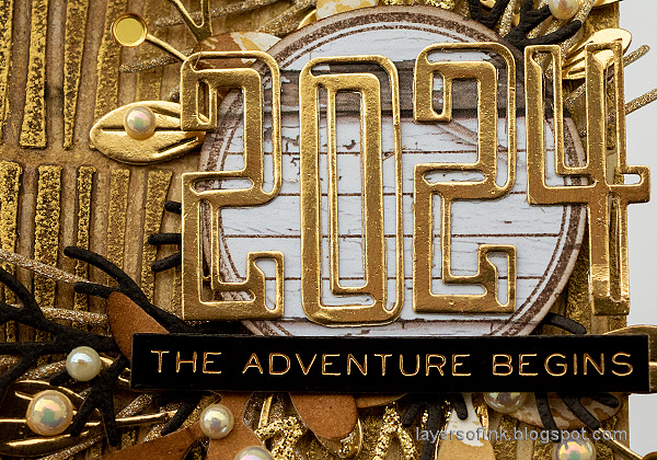 Layers of ink - New Year's Tag Tutorial by Anna-Karin Evaldsson. Tim Holtz Alphanumeric Emporium.