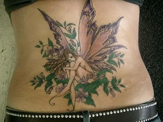 1. Beautiful Stylish Women Stomach Tattoos Designs